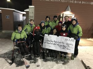 TruStone Financial staff presented a check for more than $8,000 to staff of Courage Kenny’s Sports and Recreation Department during one of the non-profit’s recent ski events at Hyland Hills Ski Area in Bloomington, Minn.