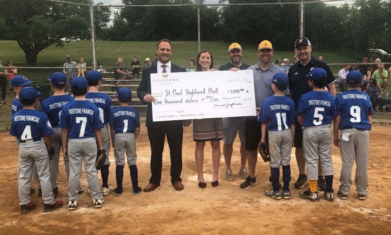 Staff from the Highland Park Little League Association accepted the $1,000 donation at TruStone Financial’s Highland branch.