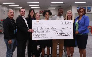 In honor of their Prep Sports Hot Highlights win, TruStone Financial presented a check for $1,000 to the Fridley High School boys’ football team.