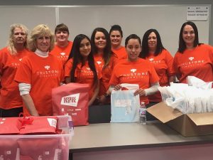 On CU Forward Day, TruStone Financial’s Northside, Wisconsin team assembled youth savings kits for United Way Kenosha and a leadership gift bag for attendees of the Kenosha Area Business Alliance Inspire Conference.