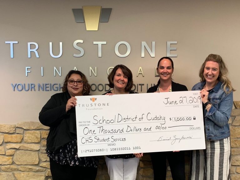 Staff from the school district of Cudahy accepted the $1,000 donation at TruStone Financial’s Cudahy branch.